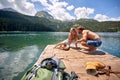 Man and girl Enjoying Near lake. Couple in love Royalty Free Stock Photo