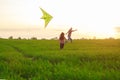 A man with a girl launches a kite Royalty Free Stock Photo