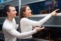 Man with girlfriend choosing aquarium fish in aquarium Royalty Free Stock Photo