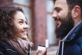 A man gives a girl a box with a ring and offers her to marry. Portrait, close-up Royalty Free Stock Photo