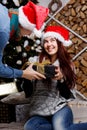 Man gives girl Christmas present Royalty Free Stock Photo