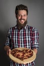 Man gives heart shapes pizza