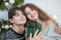 A man gives a woman a Christmas present Royalty Free Stock Photo