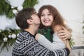 A man gives a woman a Christmas present Royalty Free Stock Photo