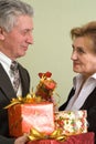 Man gives a woman gifts Royalty Free Stock Photo