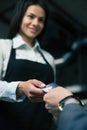 Man giving bank card to female waiter in cafe Royalty Free Stock Photo