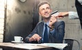 Man giving bank card to waiter Royalty Free Stock Photo