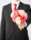 Man giving bouquet of flowers