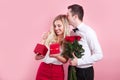 Man giving bunch of rose and gift box his girlfriend