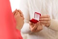 Man giving diamond ring to woman on valentines day Royalty Free Stock Photo