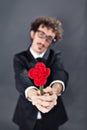 Man giving fabric rose Royalty Free Stock Photo