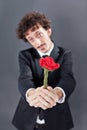 Man giving fabric rose Royalty Free Stock Photo