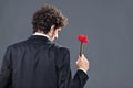 Man giving fabric rose Royalty Free Stock Photo