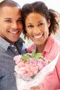 Man giving flowers to woman Royalty Free Stock Photo