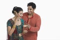 Man giving gift to his wife on Diwali Royalty Free Stock Photo