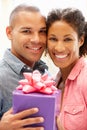 Man giving gift to woman Royalty Free Stock Photo