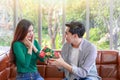 Man giving gift woman in living room Royalty Free Stock Photo