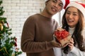 Man giving girl christmas present Royalty Free Stock Photo