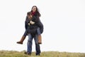 Man Giving His Wife Piggy Back Ride Royalty Free Stock Photo