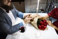 Man giving red rose bouquet Royalty Free Stock Photo