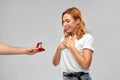 Man giving woman engagement ring on valentines day Royalty Free Stock Photo