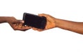 Man hand giving woman cellphone Royalty Free Stock Photo