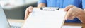 Man giving woman resume for employment in office closeup Royalty Free Stock Photo