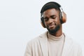 dj man african guy portrait background joy music positive american black fashion headphones Royalty Free Stock Photo