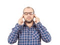 Man with glasses holding his head with his hands. Royalty Free Stock Photo