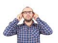 Man with glasses holding his head with his hands. Royalty Free Stock Photo