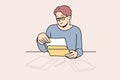 Man in glasses reading letter at table
