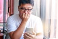 A man with glasses wearing a fat white shirt Royalty Free Stock Photo