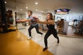 Man with glasses and a woman perform exercises with a ball Royalty Free Stock Photo