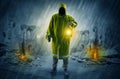 Man with a glowing lantern at a catastrophe scene Royalty Free Stock Photo