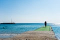 Man goes to the green pier to dive