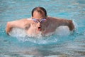 Man in goggles swimming jumped out of water Royalty Free Stock Photo