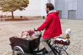 Man going back from shopping with a cargo bike