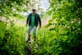 Man going through forest Royalty Free Stock Photo