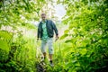 Man going through forest Royalty Free Stock Photo