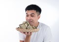 A man is going to eat delicious zongzirice dumpling on Dragon Boat Festival, Asian traditional food Royalty Free Stock Photo