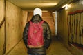 Man going in underpass. Graffiti in subway. Royalty Free Stock Photo