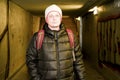 Man going in underpass. Graffiti in subway. Royalty Free Stock Photo