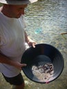 Man with gold pan Royalty Free Stock Photo