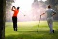 Man golfer on a golf course Royalty Free Stock Photo