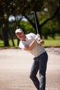 Man, golfer and hit with club on golf course in sand pit for stroke, point or strike by grass field in nature. Male Royalty Free Stock Photo