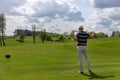 Man golfer posing at fairway on golf course Royalty Free Stock Photo