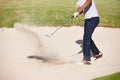 Man, golfer and swing on golf course in sand pit for par, stroke or strike on grass field in nature. Closeup of male Royalty Free Stock Photo