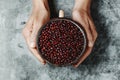 Man grabbing a pot full of adzuki beans