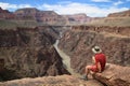 Man on Grand Canyon overlook Royalty Free Stock Photo