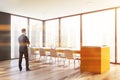 Man in gray panoramic dining room Royalty Free Stock Photo